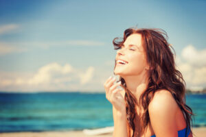 smiling woman at beach